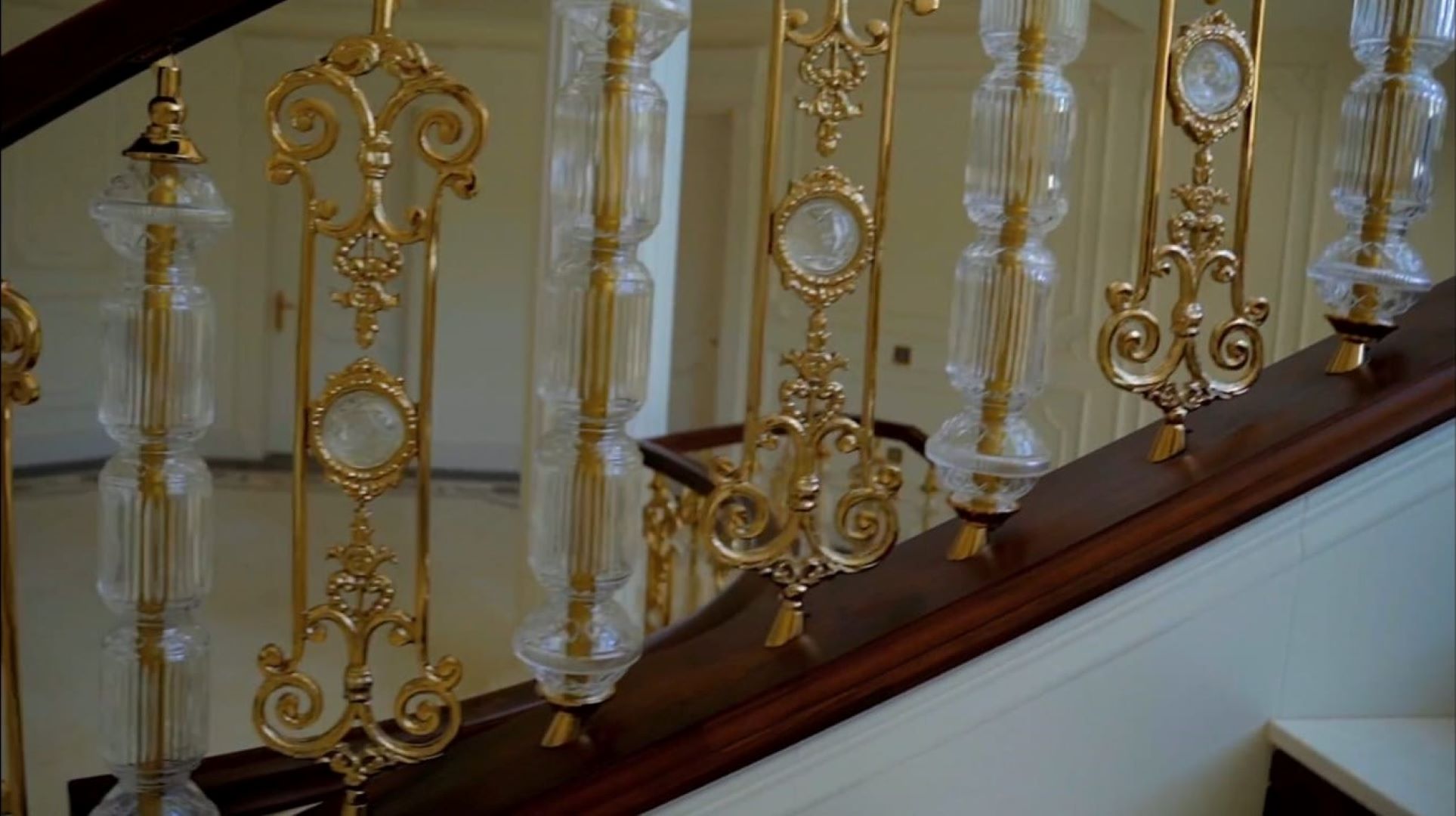 glass and brass stair railing